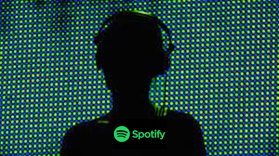 Logo de la plataforma de música en streaming Spotify con la figura de un usuario que lleva cascos por detrás.